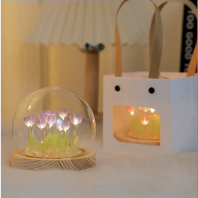 Luminous tulip dome light with glass dome and wooden base.