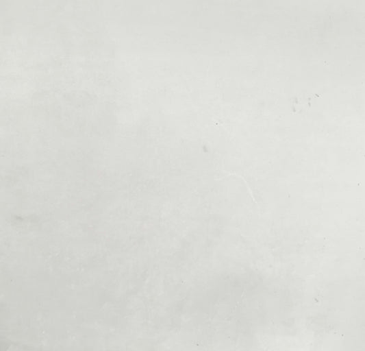 a black and white photo of a person on a surfboard