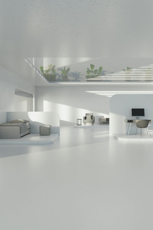 A room with a lot of white furniture in it