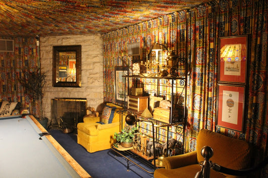 A pool room displays opulent vintage decoration.