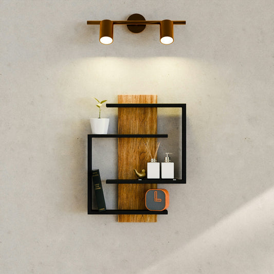Modern wall shelf with decor and spotlight.