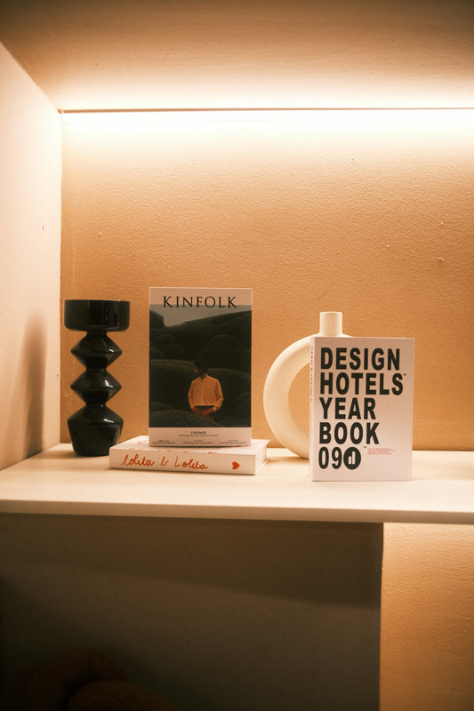 Books and decorative objects on a shelf