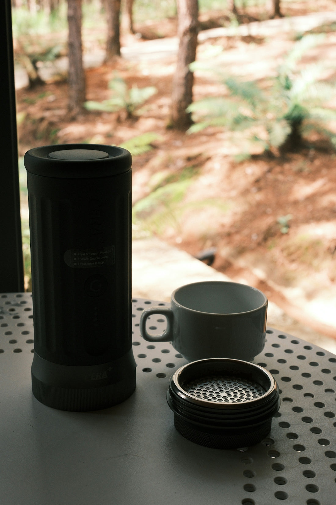 Portable espresso maker with cup and filter