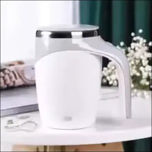 White AutoStir mug with handle for coffee.