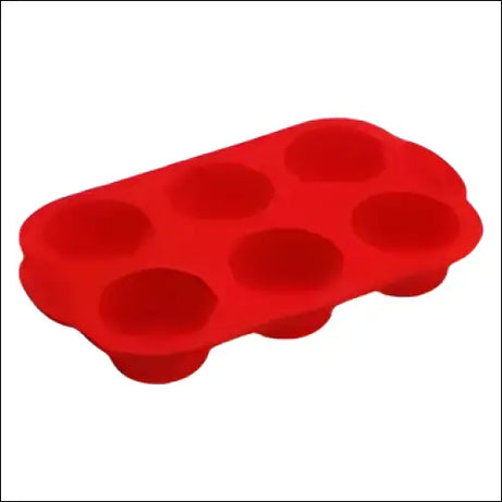 Red silicone muffin tray with six round cavities for baking.
