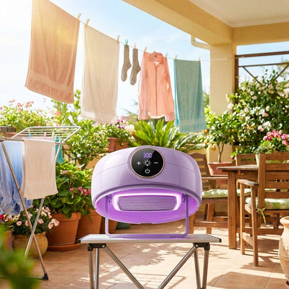 An artistic, lifestyle shot capturing the AirFlow Dryer Deluxe outdoors on a sunny patio, with a vibrant, lively background of plants and outdoor furniture. The dryer is positioned on a small, portable stand, bathed in natural sunlight enhanced by a diffus