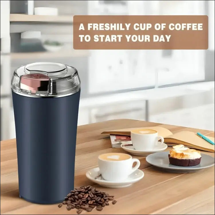 GrindMaster Go coffee grinder with fresh coffee beans