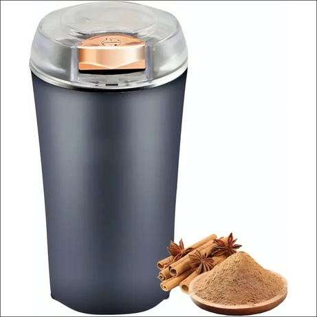GrindMaster Go spice grinder with cinnamon sticks and ground spice.