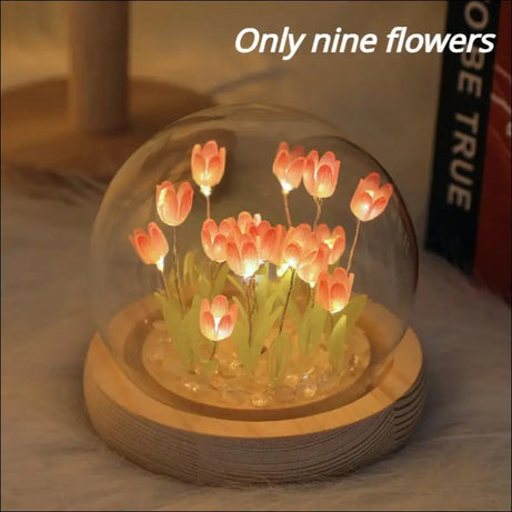 Luminous tulip dome with glowing tulip lights and a wood base.