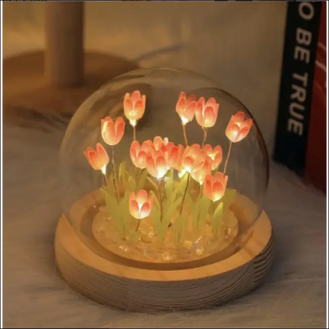 Luminous dome with glowing tulips for ambient lighting.