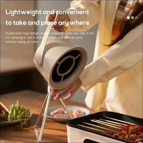 Portable smoke free fan used during grilling to eliminate smoke